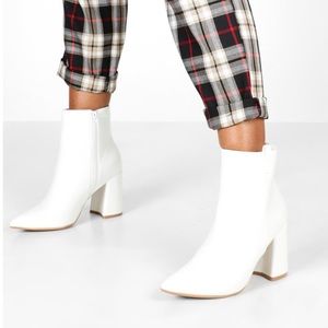Pointed block heel white booties